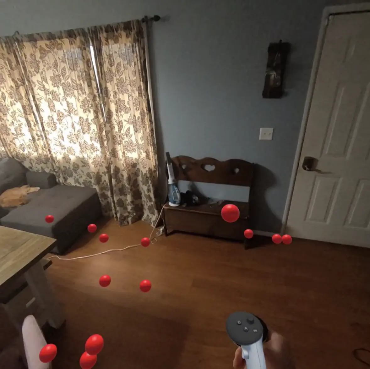 A red ball being shot from a virtual controller